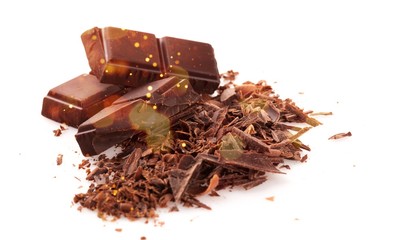 Milk chocolate blocks and pieces isolated on white background