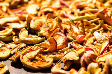 Apples are dried in the sun in the yard
