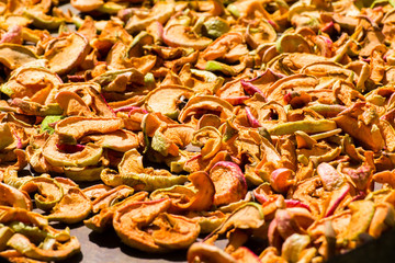 Apples are dried in the sun in the yard
