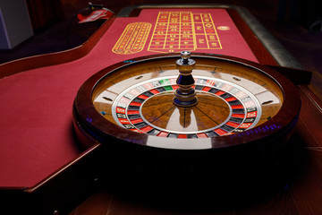 poker red table and roulette at a poker game