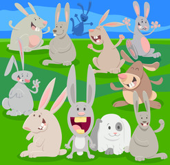 happy rabbits on meadow cartoon illustration