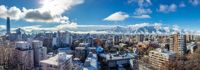 Fototapeta na wymiar Amazing views of Santiago de Chile city with the Andes mountain range making an awesome horizon during the 15th July 2017 snowstorm, the biggest snowfall in Santiago de Chile history in last decades 