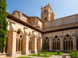 Obraz premium Cloister of the collegiate church of Santa Maria la Real in the village of Sasamon on the Camino de SAntiago, Spain.