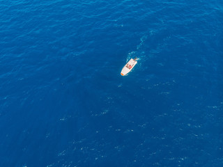 Luxury speed motor boat blue water. Aerial view