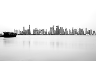 Silhouette of the  Modern Architectural Buildings of Doha skyline.