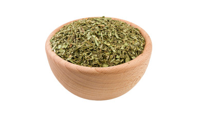 tarragon herb in wooden bowl isolated on white background. 45 degree view. Spices and food ingredients.