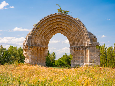 Arch of the demolished Romanesque church of San Miguel de Mazarreros in the village of Sasamon , Camino de Santiago, Spain.