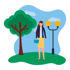 business woman standing in the park