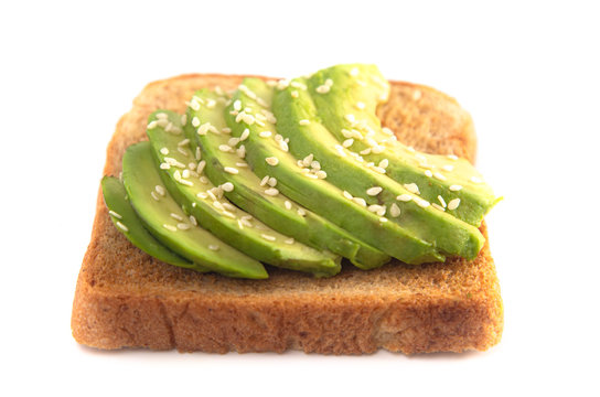 Slice Of Avocado Toast With Toppings Isolated On A White Background