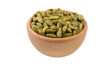 cardamon seeds in wooden bowl isolated on white background. 45 degree view. Spices and food ingredients.