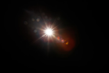 Lens Flare. Light over black background. Easy to add overlay or screen filter over photos. Abstract...