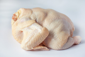 freshly cut chicken on a white background,broiler carcass white chicken meat  