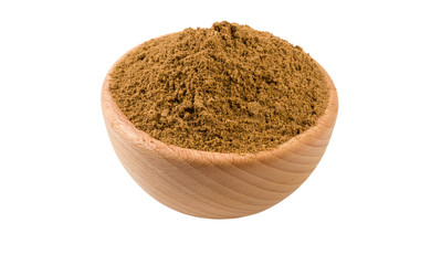 garam masala mix in wooden bowl isolated on white background. 45 degree view. Spices and food ingredients.