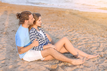 Fototapeta premium Happy young couple at sea resort