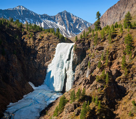 Ice waterfall in the mountains Tunkinsky loaches of the Eastern Sayan mountains