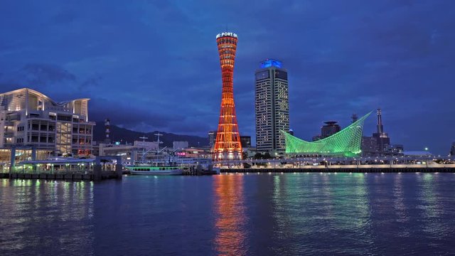 Kobe Japan Colorful Night View of Port Tower and Maritime Museum With Reflection on Water