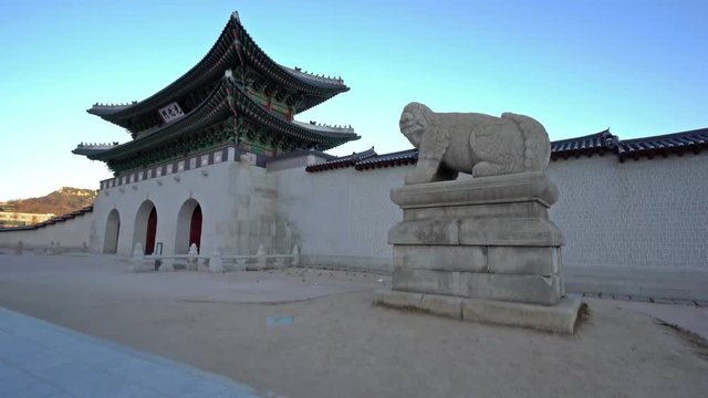 Seoul South Korea Entrance to Gyeongbokgung Royal Palace of Joseon Dynasty With Mythological Lion Haechi Statue, Pan Shot