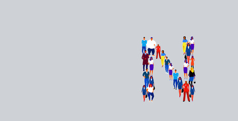 business people crowd forming shape letter N different men women businesspeople group standing together English alphabet concept full length horizontal
