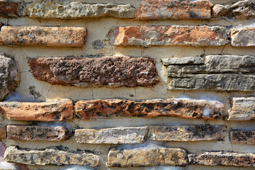 Masonry stone wall in the ancient city of side in Turkey. Natural stone background