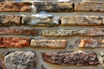 Masonry stone wall in the ancient city of side in Turkey. Natural stone background