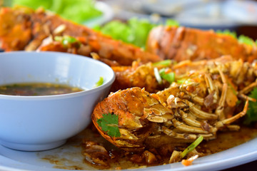 seafood Garlic fried crayfish and steamed rice are delicious and very popular food.