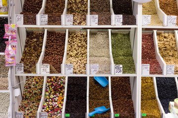 Veliky Novgorod, Russia – July 4, 2019. Russian market selling different types of nuts, seeds and...