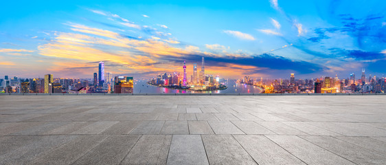 Empty square floor and modern city skyline in Shanghai at sunset,high angle view