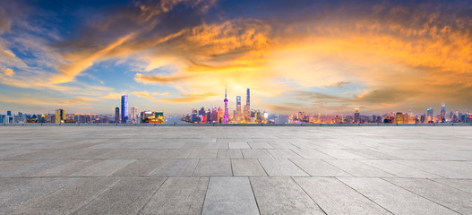 Empty square floor and modern city skyline in Shanghai at sunset,high angle view