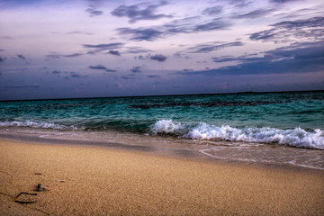 This unique picture shows the gigantic sunset in the Maldives. you can easily see how the sky bursts and everything turns orange