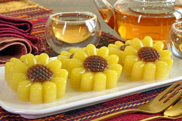 Thai dessert : Layer sweet cake (or Khanom Chan) Thai traditional dessert in beautiful sunflowers....