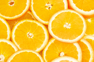 Orange fruits slices background
