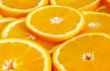 Orange fruits slices background