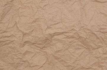 Old crumpled brown paper background