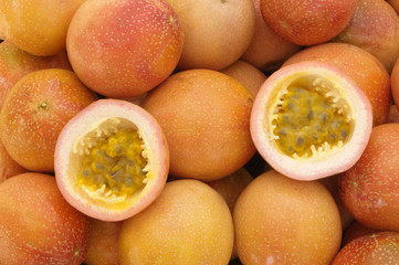 Ripe passion fruits background