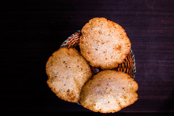 hot ney pathiri in a wooden plate 