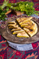 Lobiani - traditional Georgian bread stuffed with red, white beans filling. Vegetarian vegetables baked pie with lobio. 
