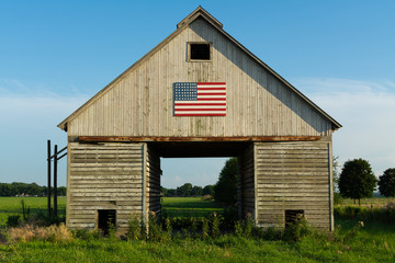 Old wooden barn with American Flag © EJRodriquez