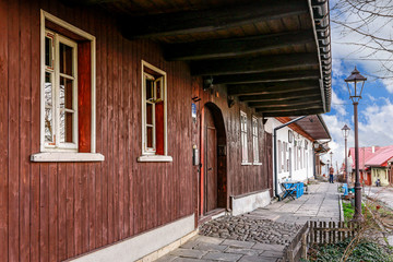 LANCKORONA, POLAND - SEPTEMBER 17, 2016: Historic city centre of Lanckorona, polish resort. Wooden huts, inscribed on UNESCO world heritage list