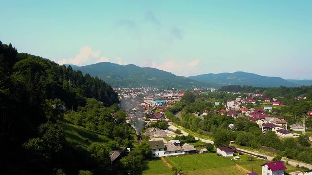 Mocanita - The romanian steam train in Viseul de sus, Maramures. Train filmed from a drone.