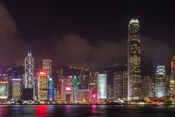 Victoria Harbor of Hong Kong City at a foggy night