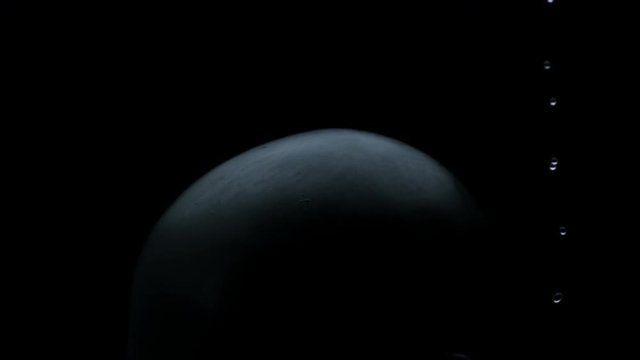 vfx plate shot of water spill drops on black sphere head and background v06