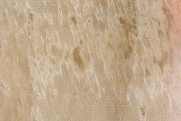 Texture of a concrete wall with cracks and scratches which can be used as a background
