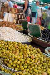 Fresh olives, regional products on street market in Aix-en-Provence, France