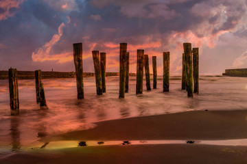 The remains of the decaying jetty at Patea in New Zealand