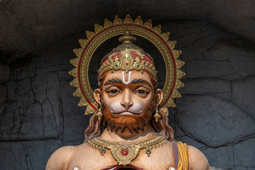 Hanuman statue, Hindu idol near Ganges River, Rishikesh, India. Sacred places for pilgrims