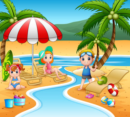 Obraz na płótnie Canvas Children enjoying a summer vacation on the beach