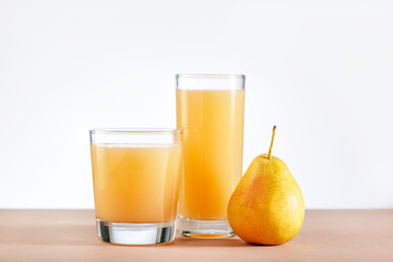 Pear Juice with fresh fruits on table. Copy space.