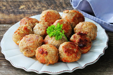 Fried meat ball, delicious meat cutlets on rustic dark table