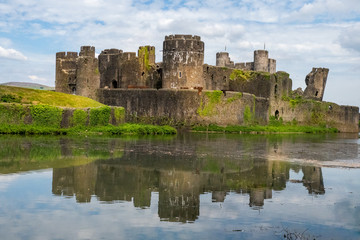 Caerphilly Castle and reflections in the moat