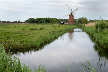 Fototapeta premium Horsey windpump and canal. Norwich, UK
